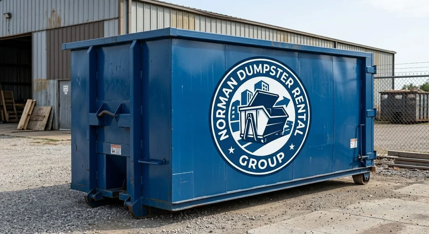 A Norman Dumpster Rental Group dumpster staged on a driveway, ready for a yard-waste and storm-debris cleanup